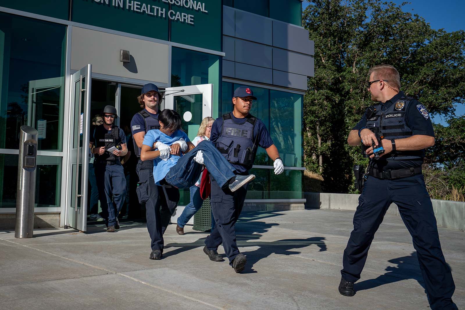 Officers from Weber State University’s Police Department and first responders from around Northern Utah respond to an active shooter drill at Weber State’s Ogden campus on Wednesday, August 23, 2023.