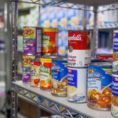  Cans line the shelves at the University of Utah’s Feed U pantry