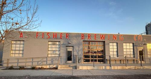 Josh Scheuerman says Fisher Brewing was the “anchor” of the Granary District. The building was once the site of an old auto shop, but in 2017 opened its doors as a member of the local craft beer scene.