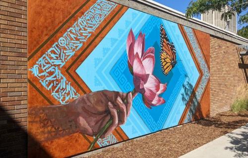 Luis Novoa, Alan Ochoa and Miguel Galaz — known together as Roots Art Kollective — completed a mural for the new Peace and Justice Garden at Salt Lake Community College's South City Campus. The artists are all SLCC alumni.(Jonny Tollestrup | Globeslcc.com) Luis Novoa, Alan Ochoa and Miguel Galaz — known together as Roots Art Kollective — completed a mural for the new Peace and Justice Garden at Salt Lake Community College's South City Campus. The artists are all SLCC alumni.